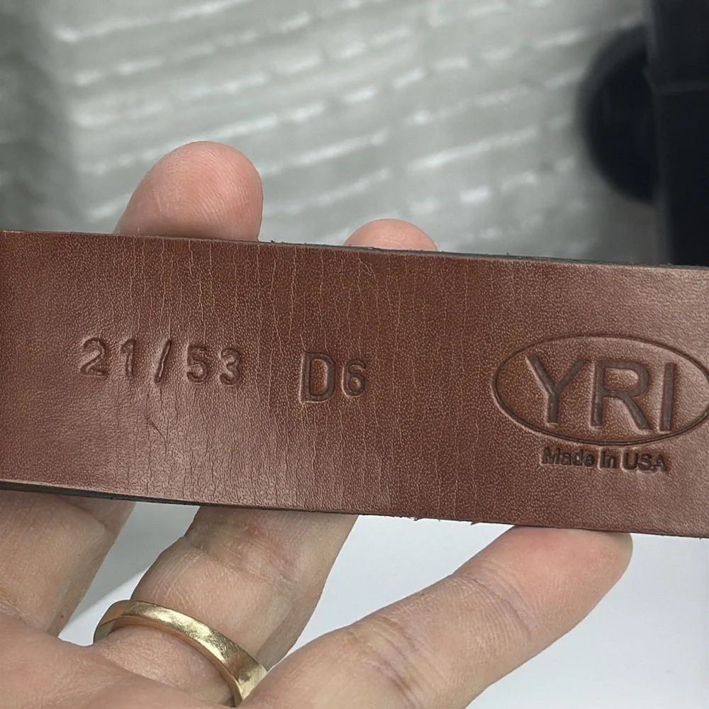 (H)Two Pebble Beach boys' leather belts with black and white metal silve buckles